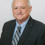 A Tribute to Mark C. Schug’s Career in Economic Education