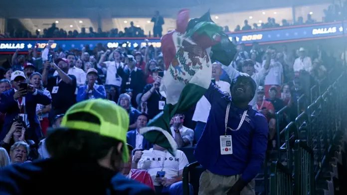 Crowd erupts as Vance smacks down protester waving Mexican flag: 'Get your a-- over there'
